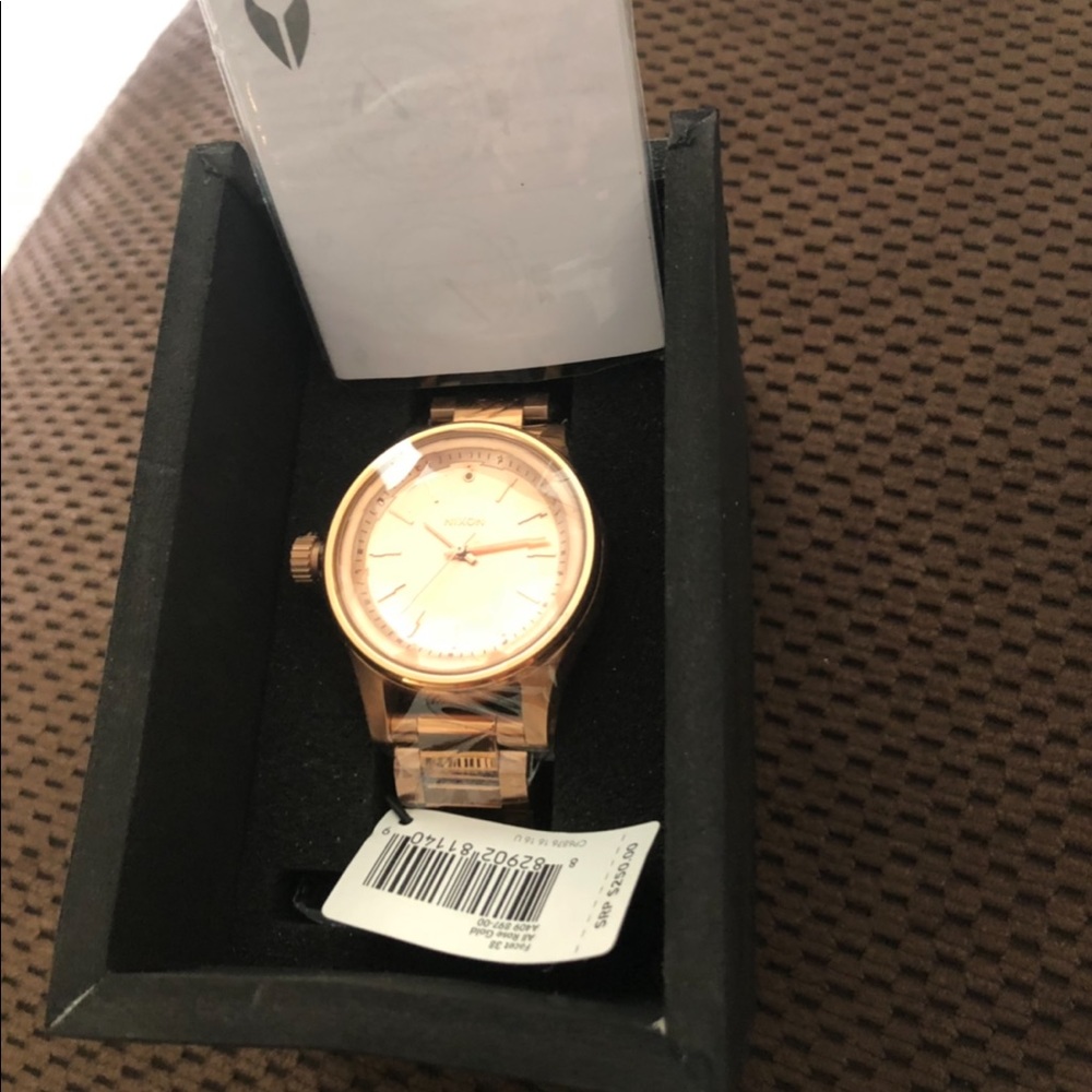 Nixon facet watch in rose gold